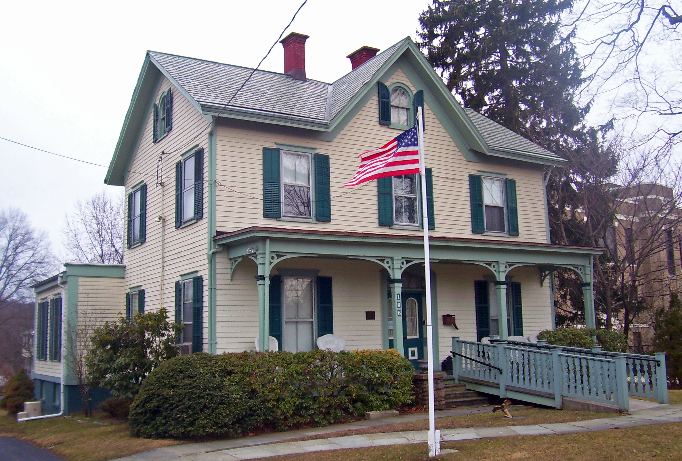House with a flag on its yard